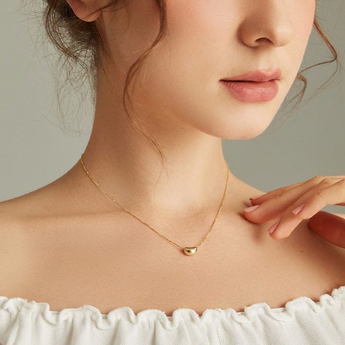 bean necklace on model