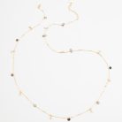 delicate necklace with trillion cut cz's and gold discs