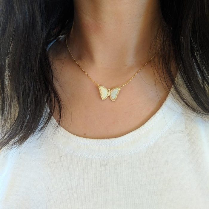opal butterfly on woman